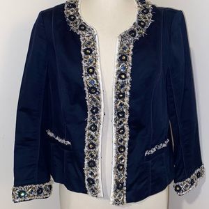 White House Black Market navy blazer with textural detailing and beading.